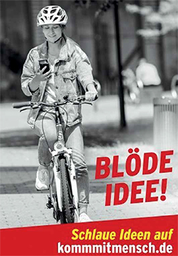Plakat zur Kampagne: Radfahrerin mit Handy